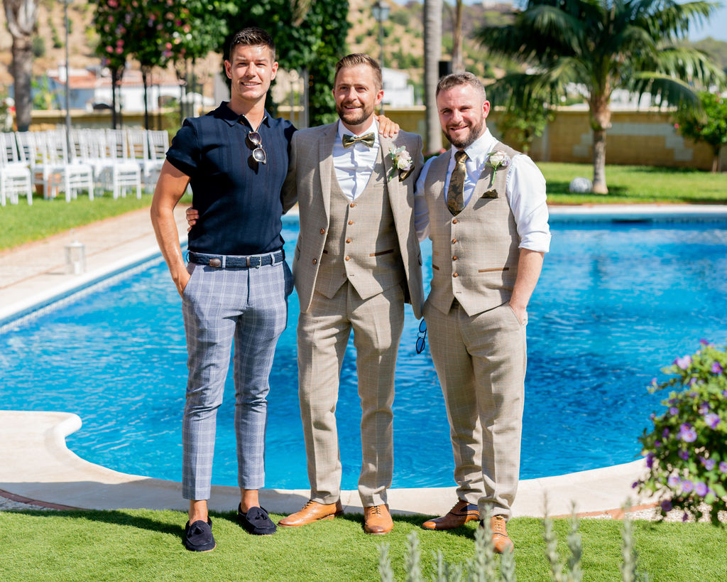 Ryan Andrews, George McMahon and Dave O'Sullivan standing beside the swimming pool at Cortijo Maria Luisa, before George and Rachel's private and exclusive wedding ceremony celebrated by Keith DuffyPic: Dougie Farrelly, Silverscreen.ie