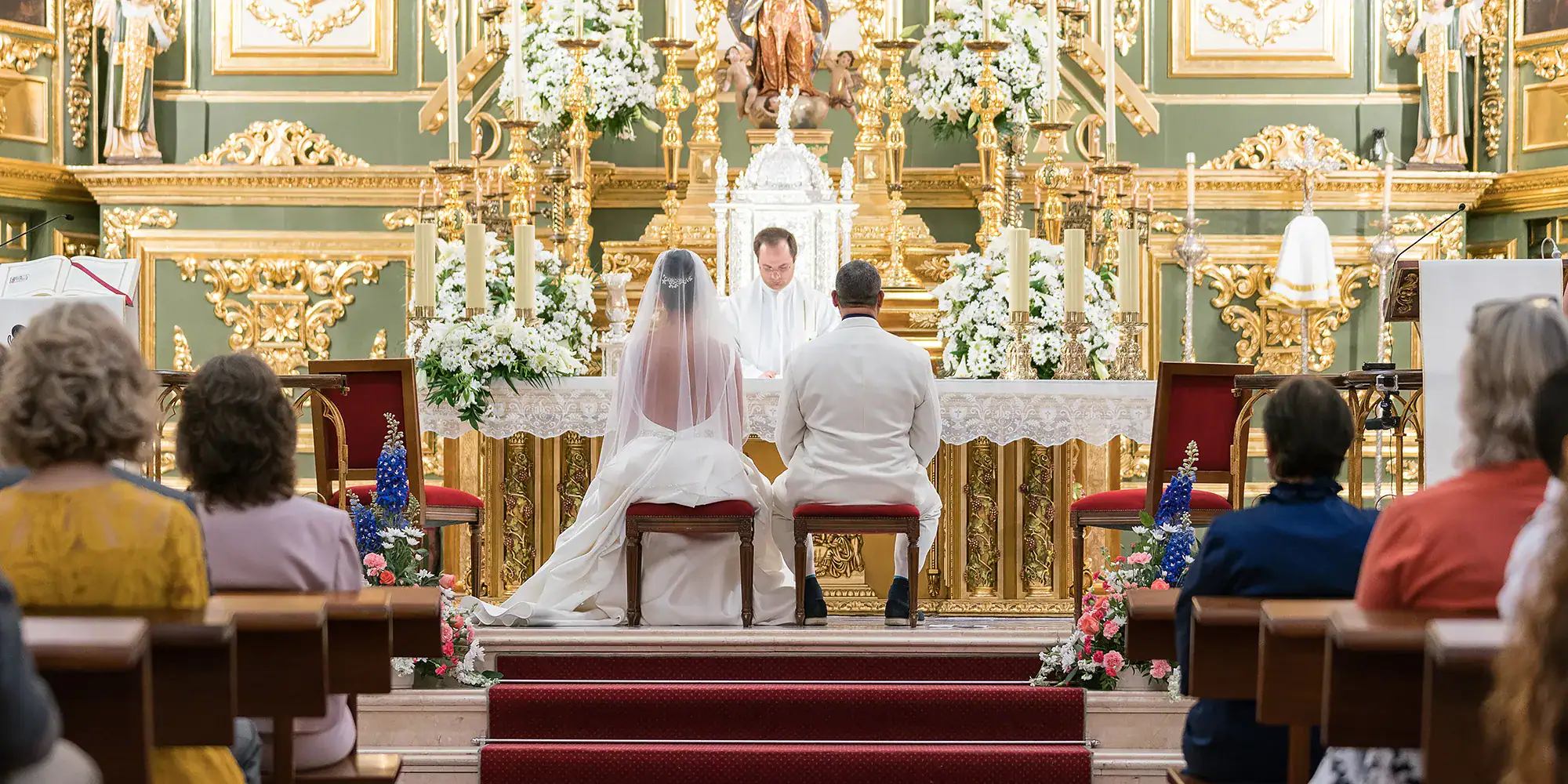 Bride and groom during their wedding ceremony at Iglesia Nuestra Señora de la Encarnación in Marbella, Spain. © All Rights Reserved Dougie Farrelly Silverscreen.ie