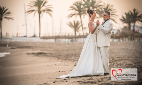 A romantic beachside moment as the bride and groom share their first dance on the sands of Marbella, with golden light and palms swaying in the background.
© All Rights Reserved Dougie Farrelly Silverscreen.ie Sunset Beach Wedding in Marbella – Romantic First Dance